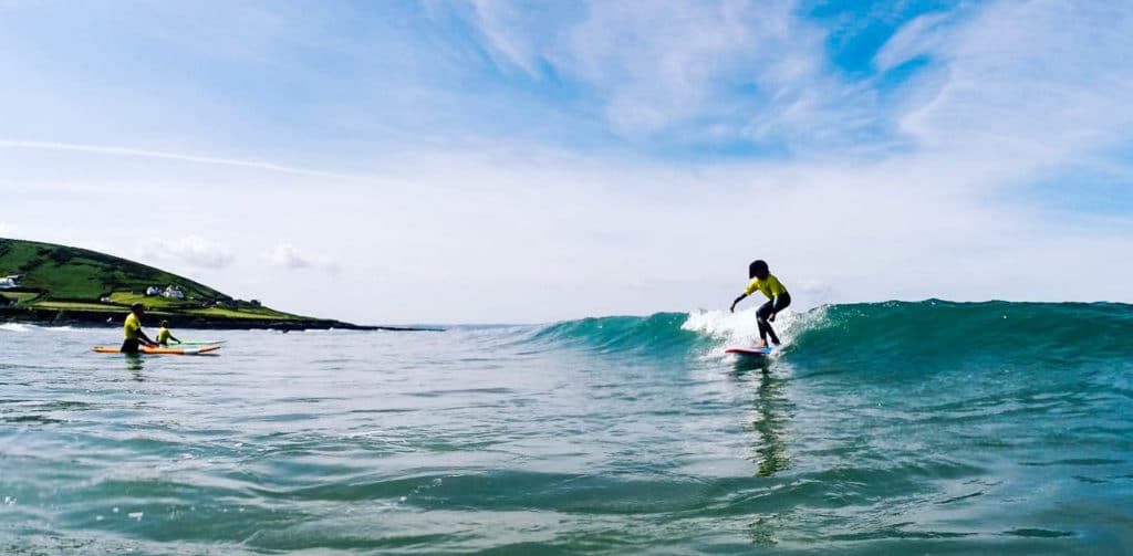 kids learning to surf